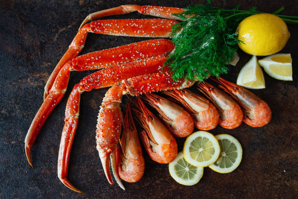 istock Crab claws and shrimp with lemon 647074726