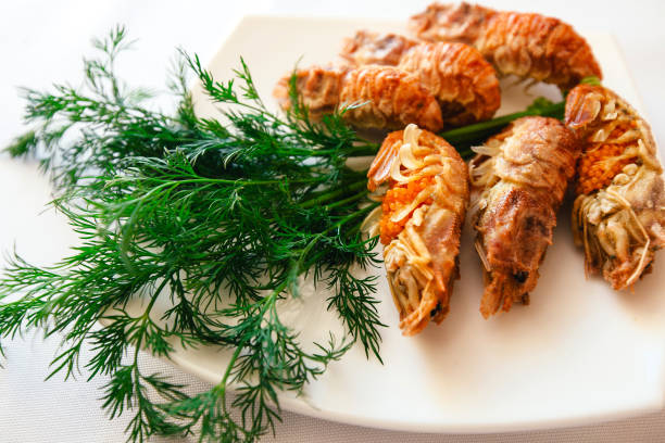 istock Spiked shrimp-bear on a white plate with fennel 647074832