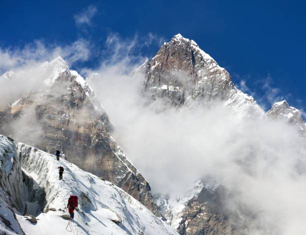 istock group of climbers on mountains montage to mount Lhotse 647080480