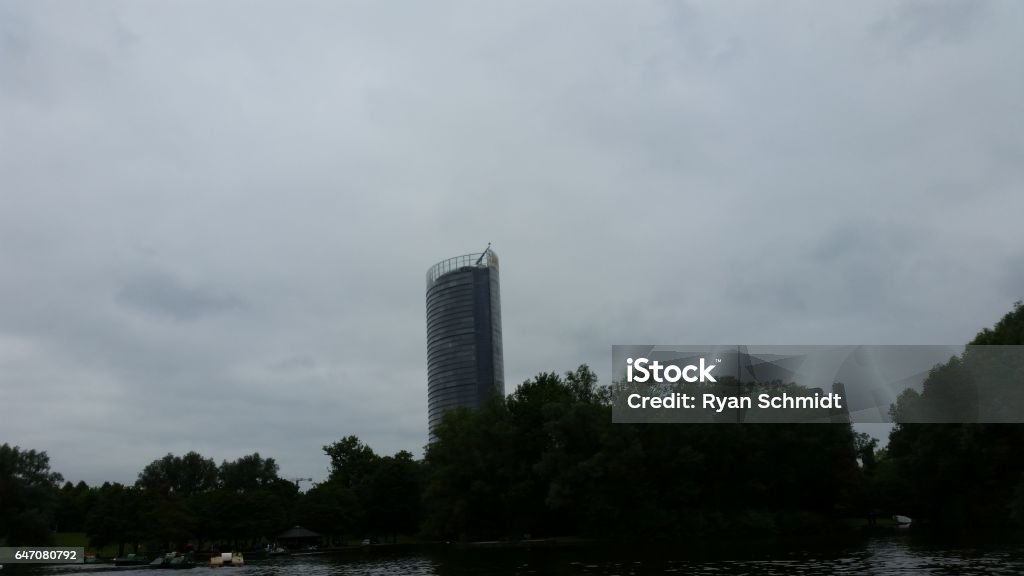 DHL Post Tower in Bonn DHL Post Tower in Bonn, Germany during a rainy and cloudy day. Building Exterior Stock Photo