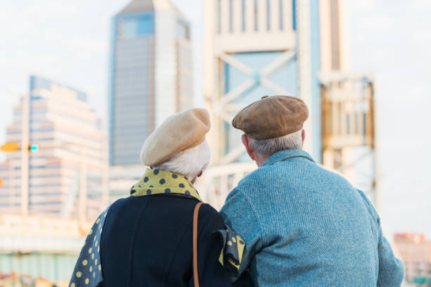 An elderly couple enjoying their peaceful day at home, as a mature retired couple.