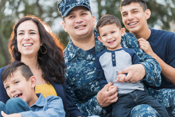 istock Hispanic military man with his family 647099302
