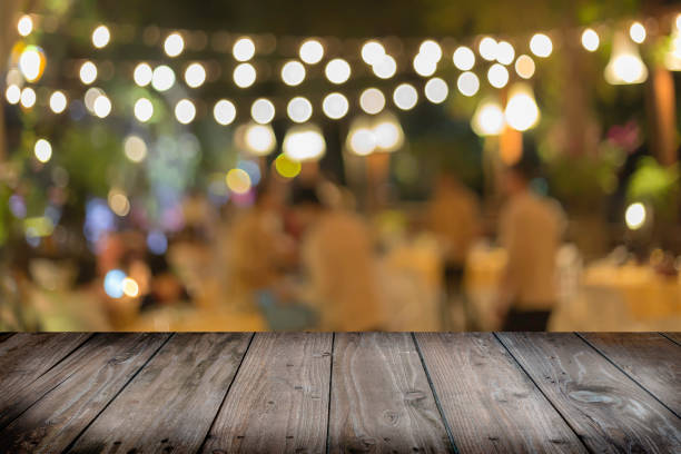 istock old wood table with lighting bokeh blurred background 647100360