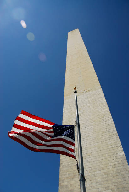istock Half Mast flag in front of Washington Memorial 647103498