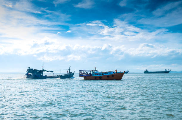 istock Sailboat on tropical coastline 647117156