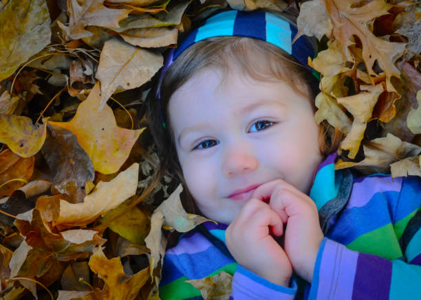 istock Girl in Leaves 647119892