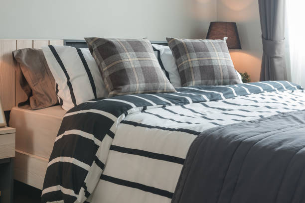 istock modern bedroom design with black and white blanket 647140374