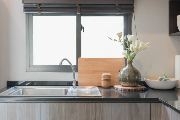 istock modern kitchen room with black granite on top of counter 647140400
