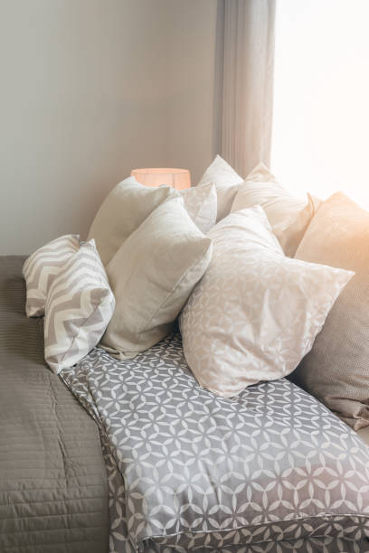 istock set of pillows on bed in cozy bedroom 647140544