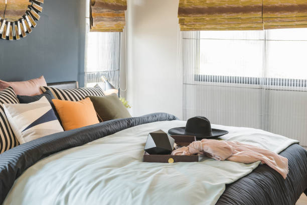 istock set of pillows on bed with blanket 647140682