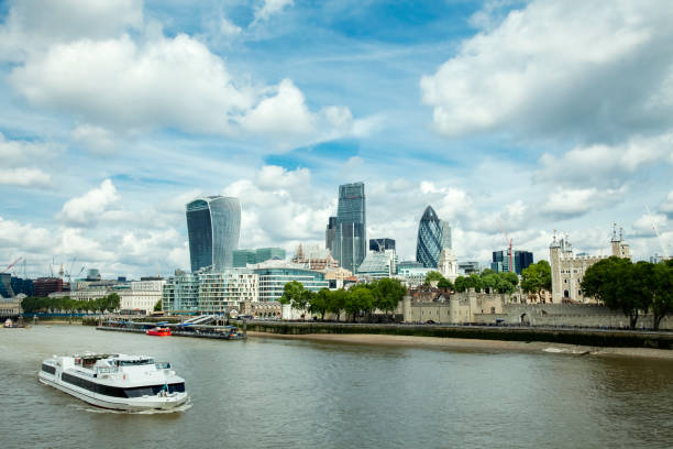 istock London Business District, with boat on the Thames 647140974