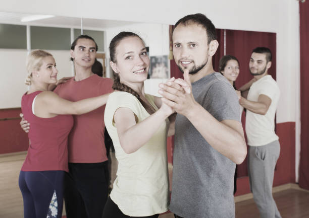 istock Unprofessional dancers dancing waltz 647141648