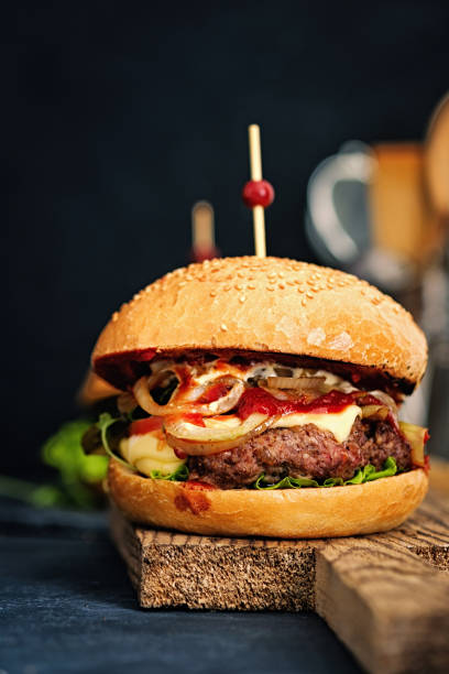 istock Delicious homemade hamburger with arugula and chard. 647150590