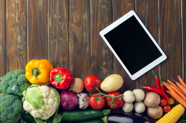 istock Group of vegetables on a wood background. 647156876