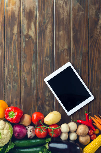 istock Group of vegetables on a wood background. 647156884