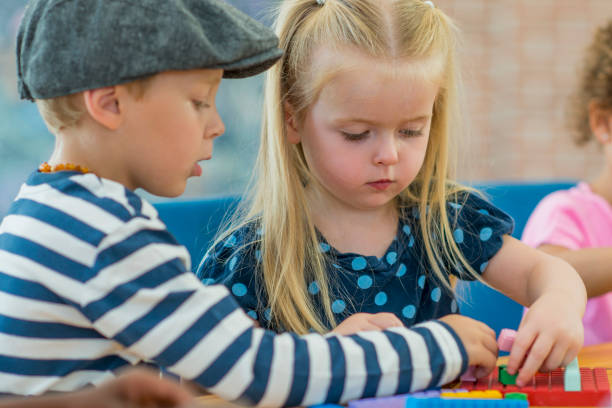 istock Preschoolers Playing Together 647156922