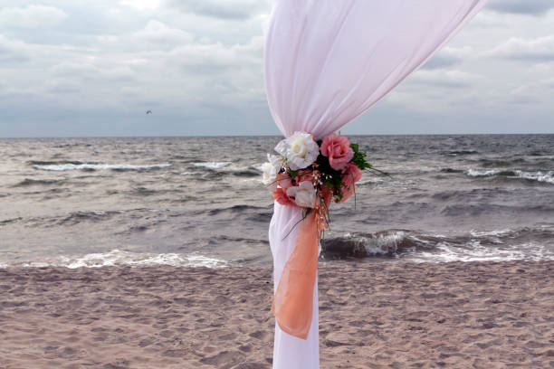 istock Part of wedding gate on the sea shore 647166996