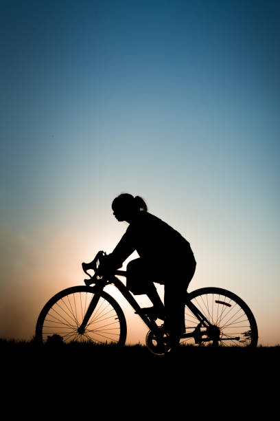 istock Women with bike 647168262