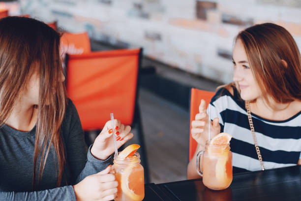 istock girls with cocktails 647174852