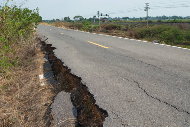 istock Asphalt surface on the street was demolished due to poor construction. 647176712