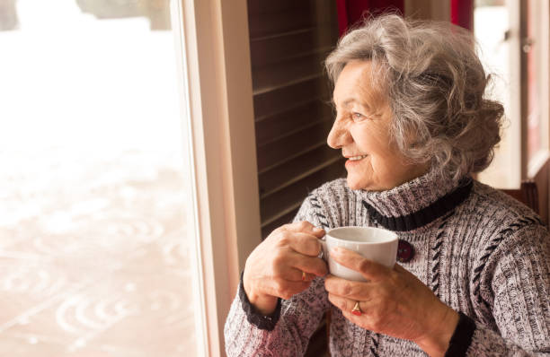 istock Senior woman drinking coffee 647180034