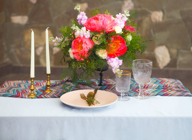 istock Table setting in vintage style is decorated with flowers 647188130