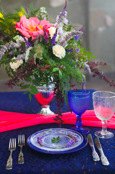 istock Table setting in vintage style is decorated with flowers 647188382