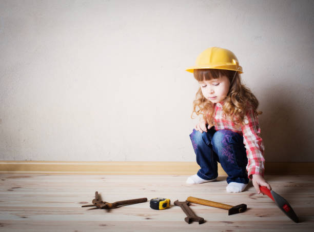 istock little girl plays in the builder 647191184