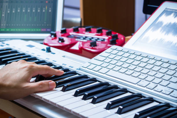 istock male hands working on sound studio equipments 647197226