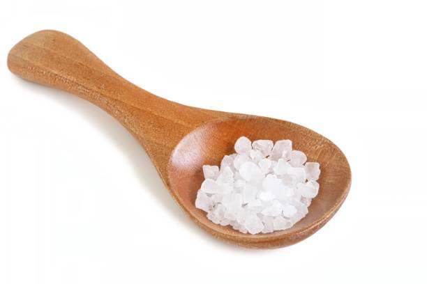 istock Rock Salt on Wooden Spoon 647203778