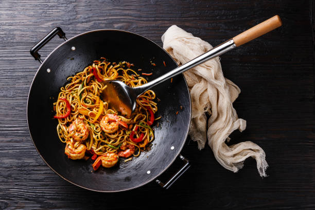istock Udon stir-fried noodles with prawn shrimp and vegetables 647203876