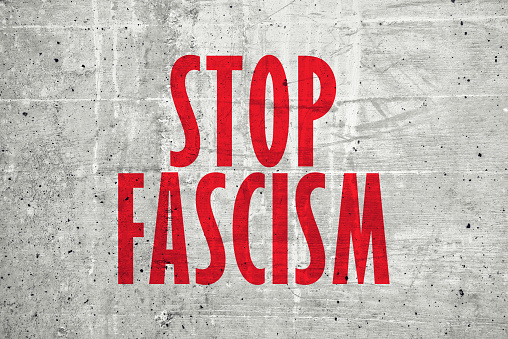 Stop fascism message on concrete wall