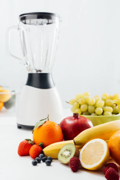 istock Healthy fresh fruit and blender on the kitchen table, healthy eating concept 647209638