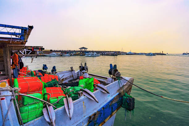 istock Boat with sunset and seascape 647210056