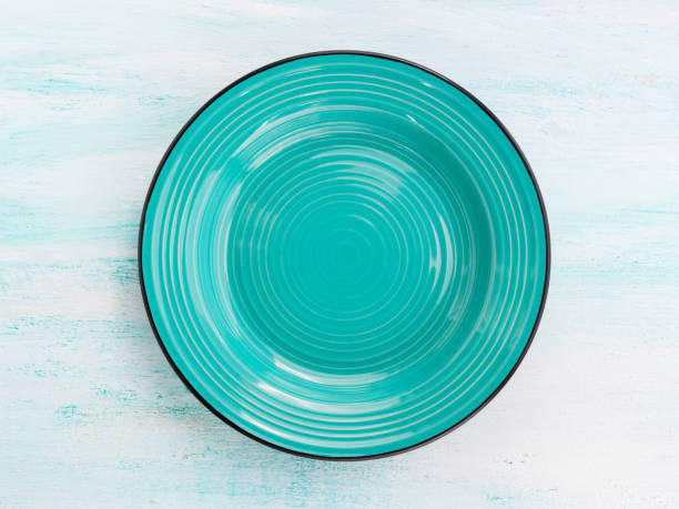 istock Pastel Color ceramic plate dish top view background 647210222