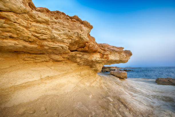 istock by erosion affected rocks on the sea 647218546