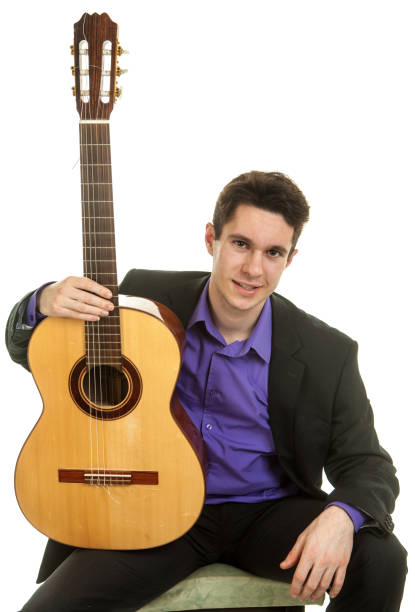 istock Musician holding classical guitar 647218844