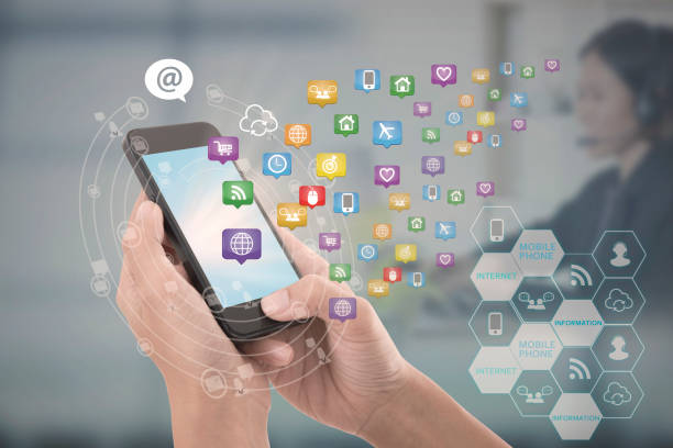 istock hand touching screen smart phone with application technology social media. 647220942