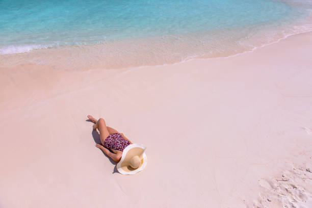 istock Young Woman on Tropical Beach 647221298