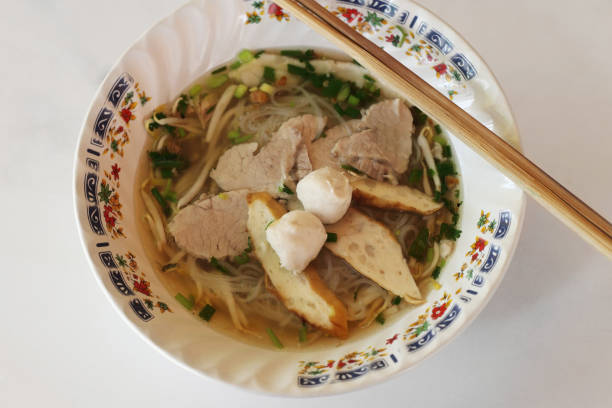 istock Asian rice noodle recipe with pork and fish ball. 647231180