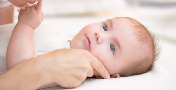 istock Baby boy with mother 647232428