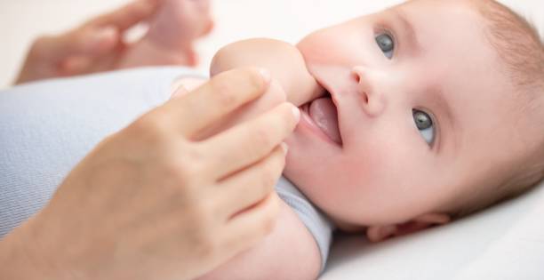istock Baby boy with mother 647232458