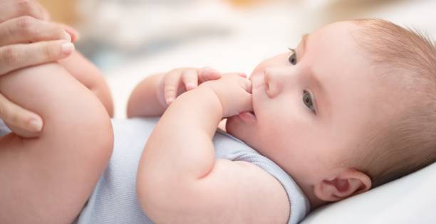 istock Baby boy with mother 647232478
