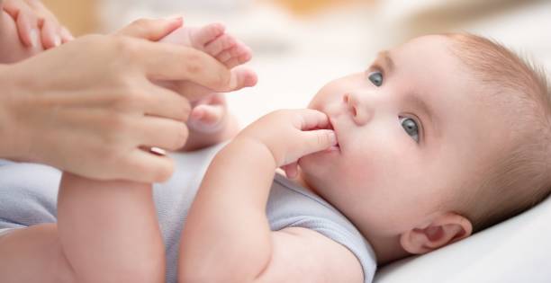 istock Baby boy with mother 647234700