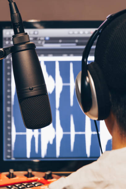 istock condenser microphone recording acoustic guitar in studio 647235054