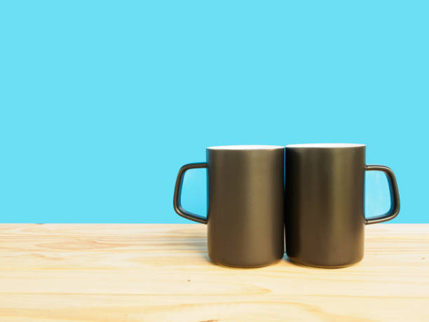 istock coffee or tea in cup on wooden table of blue background 647242890
