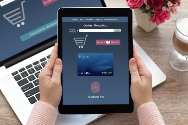 istock woman hands holding tablet online shopping touch and pay notebook 647242918