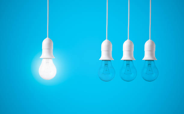 istock difference light bulb on blue background. concept of new ideas 647243012