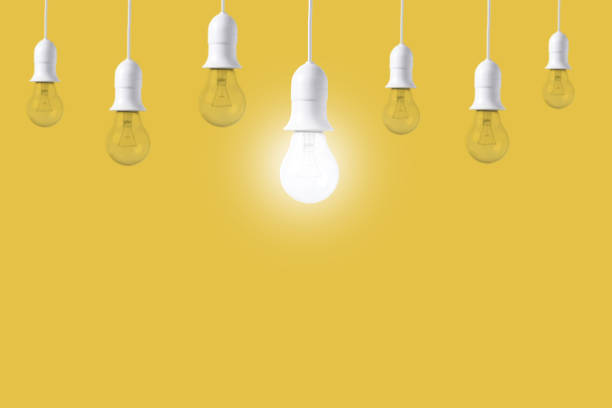 istock difference light bulb on yellow background. concept of new ideas 647246804