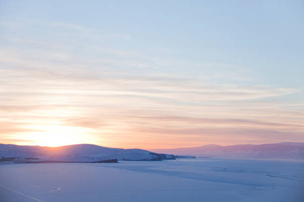 istock Baikal Lake, winter nature landscape. Sunset 647247222